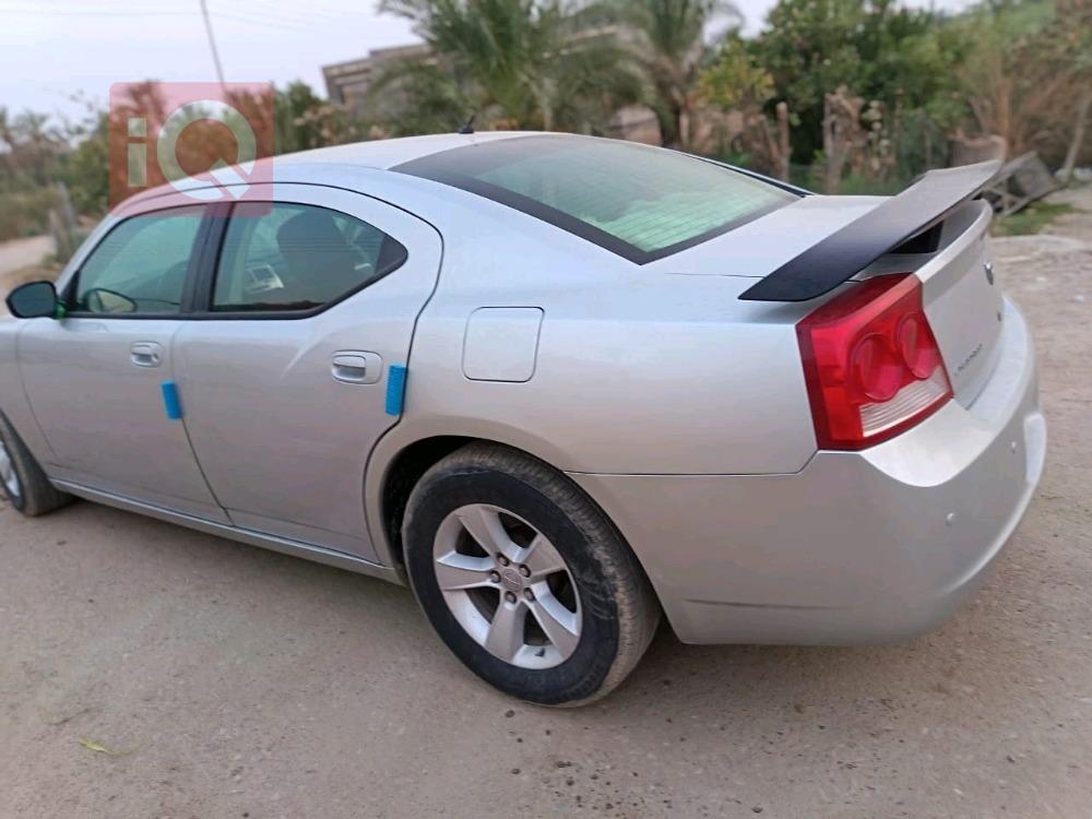 دۆج چارجەر